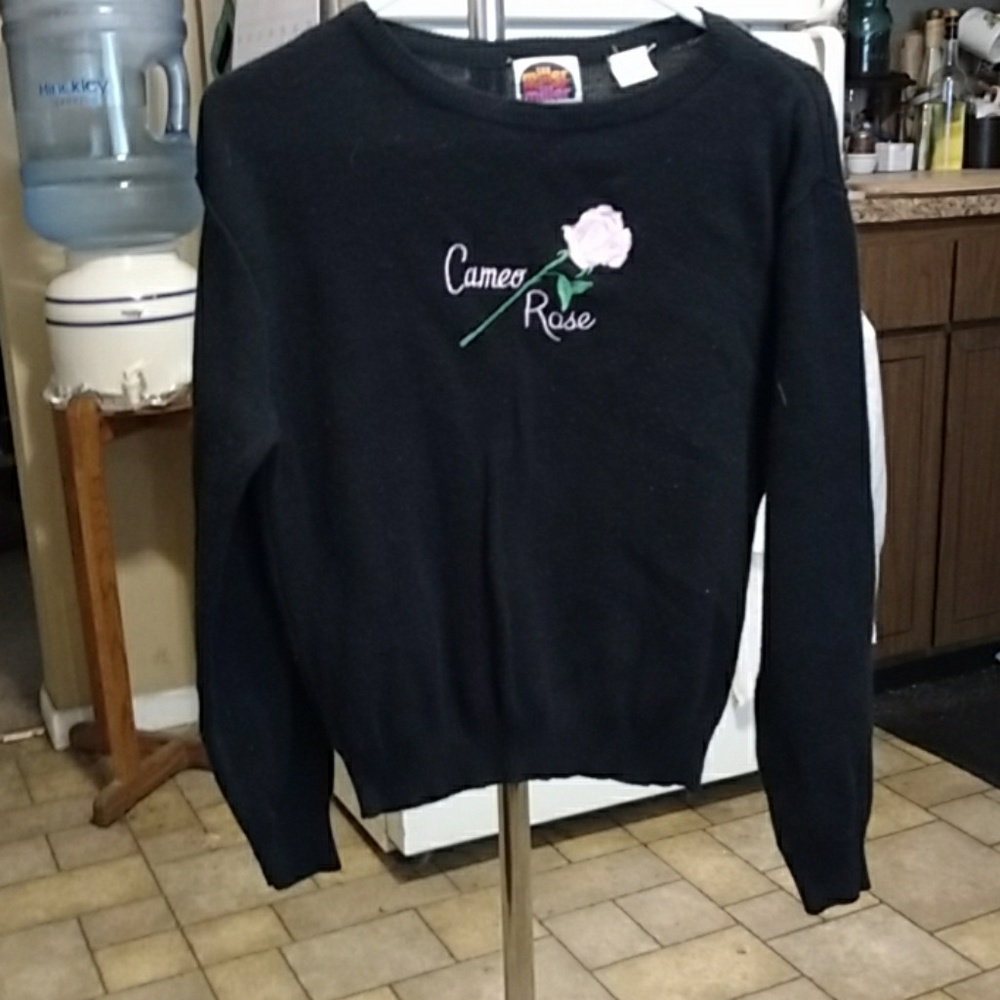 Long sleeve black sweater made by Miller